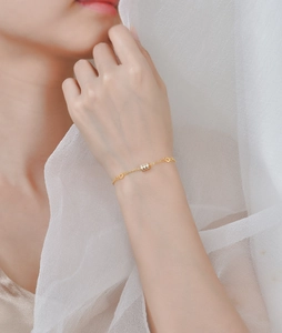Elegant 925 sterling silver gold-plated bracelet with pavé zircon cylinder pendant