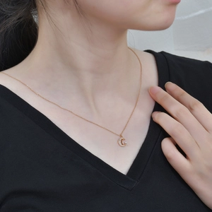 Elegant S925 silver crescent moon necklace with sparkling pavé zircons and a white pearl