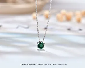 S925 sterling silver necklace featuring a six-claw green zircon heart of the ocean pendant