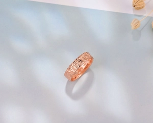 Detailed macro view of S925 silver ring featuring lava texture and lucky Fu character