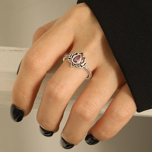 Detailed view of S925 silver lotus ring with pear-cut pink gemstone and zircon accents