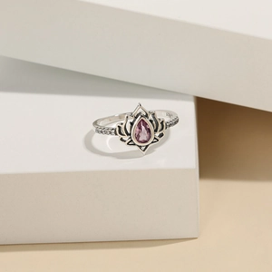 Close-up of S925 sterling silver lotus ring with pink teardrop stone and zircon details