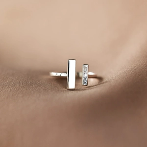 Detailed macro view of S925 sterling silver ring featuring geometric paved crystal bar