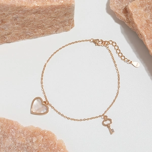 Elegant S925 sterling silver rose gold bracelet with heart shell and key charms
