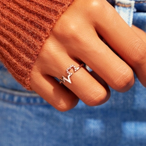 S925 sterling silver heartbeat ring with sparkling zircons worn on hand for women