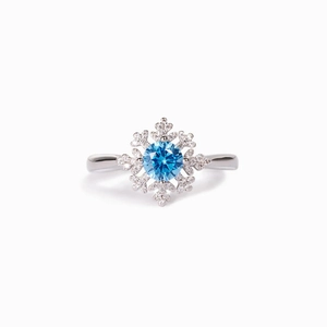 Elegant S925 sterling silver snowflake ring featuring a blue central zircon and white stones
