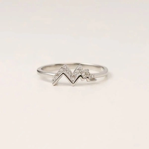 Detail view of S925 sterling silver mountain ring with zircon pavé setting for women