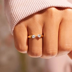 Polished gold S925 sterling silver open ring with triangle zirconia on woman's finger