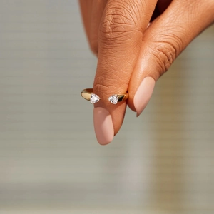 Minimalist S925 silver open ring with gold plating and dual heart-shaped zircon stones