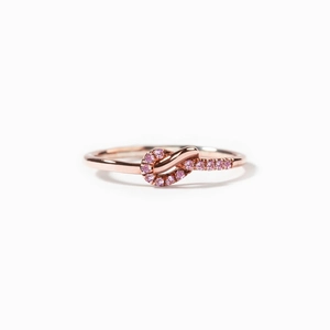 Minimalist S925 sterling silver knotted ring with pink pavé stones in rose gold finish