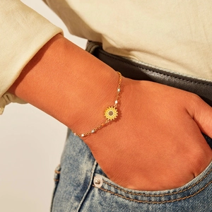 S925 silver sunflower bracelet with colorful enamel beads and golden chain on wrist