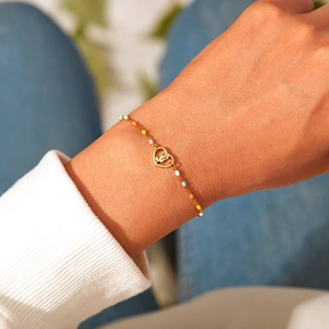 S925 sterling silver gold heart rose bracelet with colorful enamel beads on female wrist