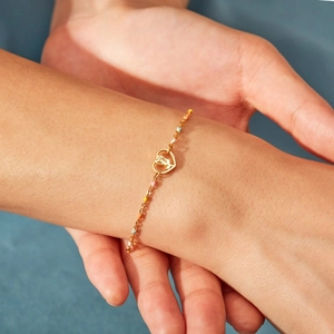 S925 sterling silver heart rose bracelet with multi-color enamel beads on female wrist