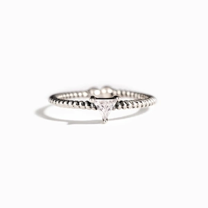Minimalist S925 sterling silver ring featuring a twisted band and triangular zircon stone