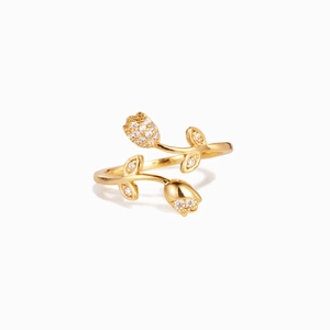 Elegant gold tulip open ring featuring sparkling pavé crystals and floral vine details