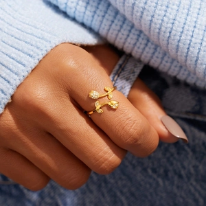 Elegant gold S925 sterling silver tulip open ring with zircon pavé stones on woman's finger
