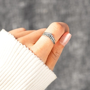 S925 sterling silver crown ring with sparkling zircons worn on a female finger