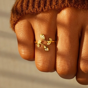 Elegant gold tulip open ring for women with cubic zirconia floral design on finger