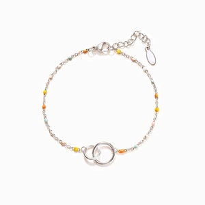 Detail of s925 silver chain bracelet featuring colorful beads and double interlaced rings