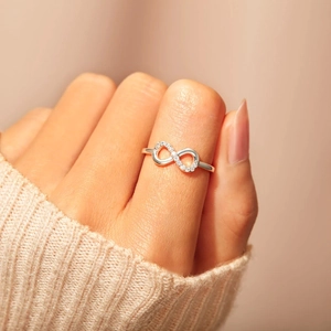 Minimalist S925 sterling silver infinity ring with sparkling cubic zirconia for women