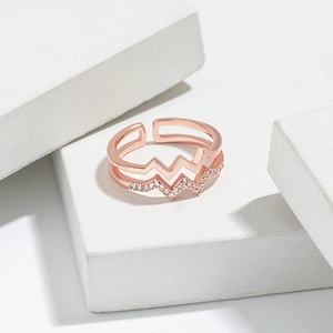 Close-up of rose gold double layer ring featuring sparkling pavé zircon and adjustable band