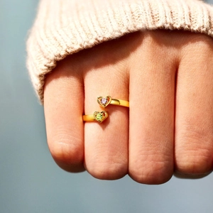 S925 silver double heart ring with pink and green zircon stones on a gold band