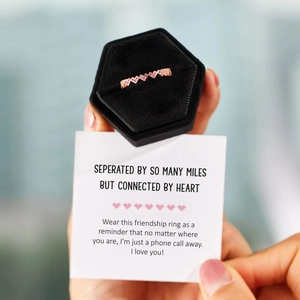 Rose gold heart-shaped zircon ring presented in a premium black velvet jewelry box with card