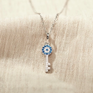 Pendentif clé en argent sterling S925 avec œil du diable et pierres de zircone