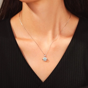 S925 sterling silver planet necklace with blue zircon and star on elegant female model
