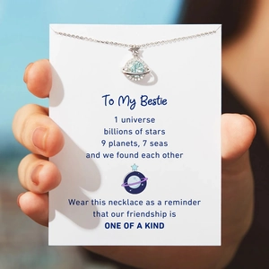 S925 sterling silver planet necklace with blue zircon on a To My Bestie gift card