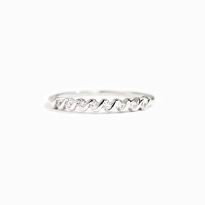 Minimalist S925 sterling silver twisted ring with shimmering zircons on white background
