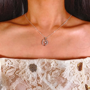 Elegant S925 silver necklace featuring a sparkling moon and star zircon pendant for women