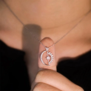 Elegant S925 sterling silver moon and star pendant necklace with cubic zirconia pave