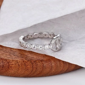 S925 sterling silver interlocking zircon ring with D-letter design on white background