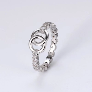 Minimalist s925 silver interlocking ring featuring sparkling pavé cubic zirconia accents