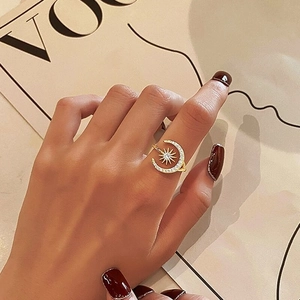 Elegant gold celestial open ring with sparkling crescent moon and star on model hand