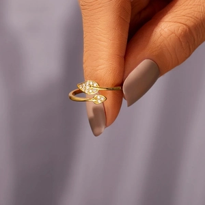 Elegant gold leaf s925 silver ring featuring zircon stones and adjustable open band design