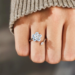 S925 sterling silver flower spinning ring with blue enamel and sparkling zircons