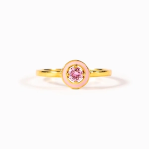 S925 sterling silver ring with pink round cut stone and pink enamel circle on white background