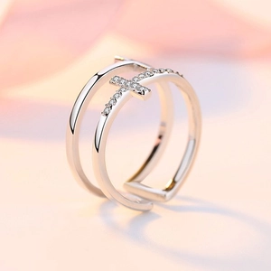 Macro detail of S925 sterling silver double layer cross ring with cubic zirconia stones