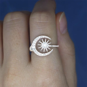 Macro view of S925 sterling silver ring featuring sparkling moon and sun zircon stones