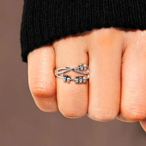 Minimalist S925 sterling silver spinning bead ring for anxiety relief on female hand