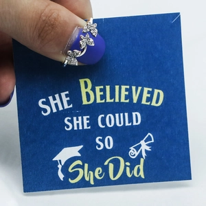 S925 sterling silver butterfly ring with cubic zirconia on a blue gift card