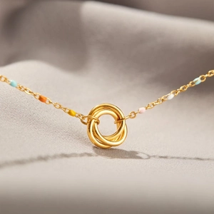 S925 silver golden necklace featuring interlocking rings and colorful enamel accents
