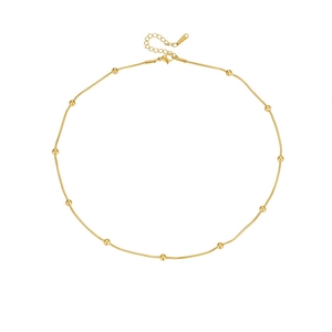 Minimalist gold beaded choker necklace with snake chain and eleven polished beads for women