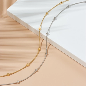 Minimalist gold and silver titanium steel snake chain necklaces with bead accents