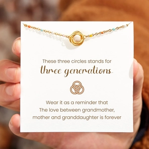 Detail of three-ring S925 silver necklace with colored beads and sentimental message card