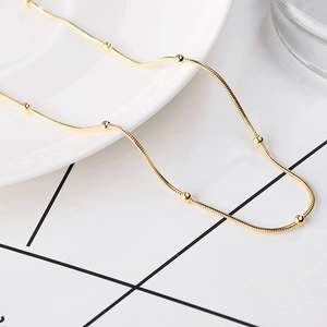 18K gold-plated titanium steel snake chain necklace with elegant bead accents for women
