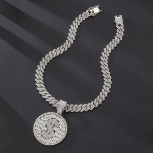 Close-up of iced out silver Cuban chain necklace with a dollar sign medallion pendant