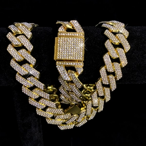 Ensemble collier et bracelet maille cubaine dorée serti de strass brillants